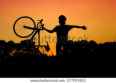 woman and road bike silhouette