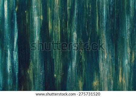 Old dark blue and green wooden background with cracked color paint, toned image