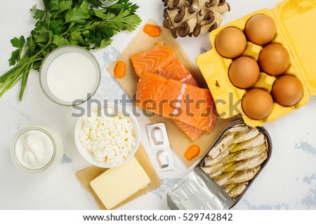 Natural sources of vitamin D and Calcium. Healthy food background. Top view. Space for text