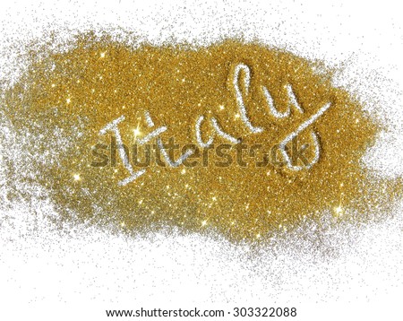 Blurry inscription Italy on golden glitter sparkles on white background