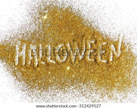 Inscription Halloween on golden glitter sparkles on white background