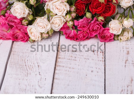 Bouquet of colorful little roses. Copy space.
