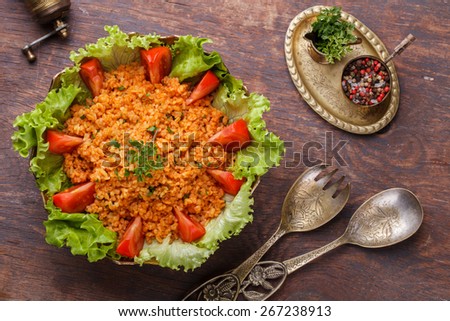 Kisir, traditional turkishr salad, Bulgur wheat   prepared with tomato paste, fresh tomatoes, parsley, olive oil.selective focus