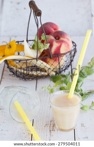 Smoothie melon and peach.Cool,healthy drink made from fresh berries and fruits. selective focus