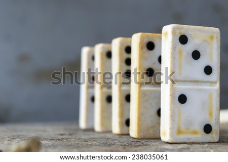 Domino game pieces in a row