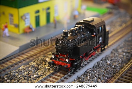 Model of a steam locomotive with smoke