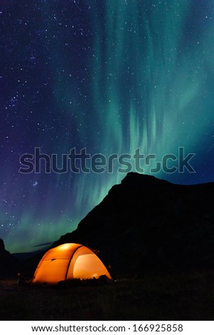 illuminated Tent and northern lights