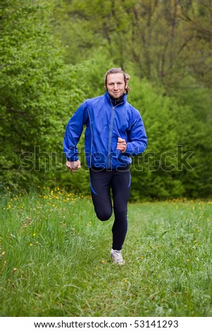 Running man on a meadow