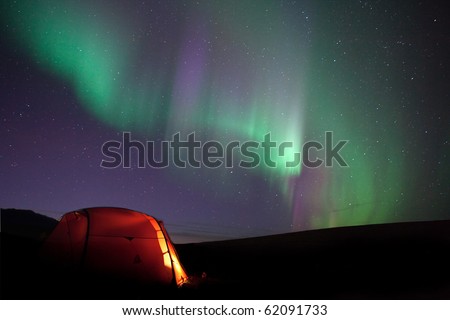 northern lights over the tent in Laponia