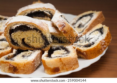 Poppy seed cake sliced rolls  with sugar powder