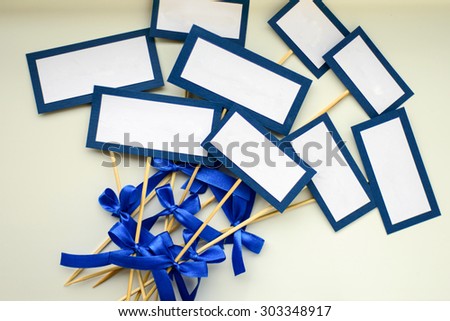 Empty blank card and copy-space for example guest names or dishes in wedding restaurant in blue tones