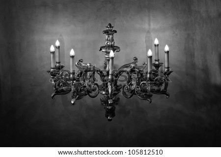 Stylish antique chandelier in black and white