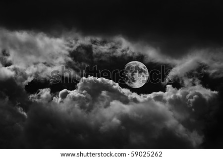 moon between clouds