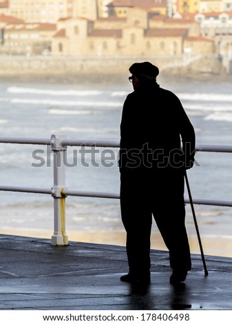 Old man with walking stick