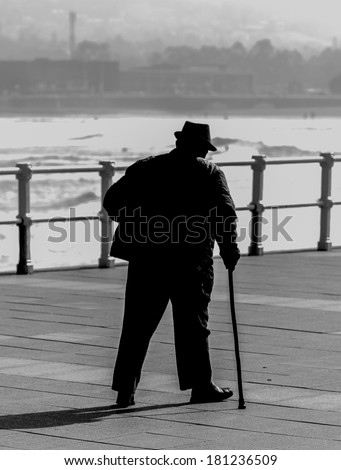 Old man with walking stick
