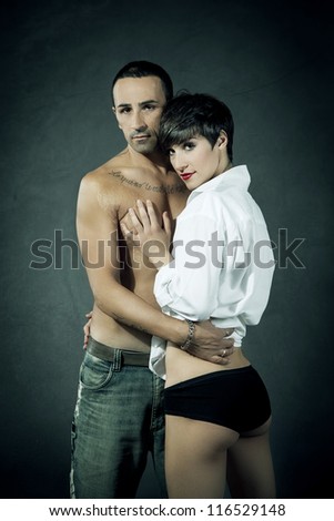 photo of attractive couple in love passion on rural background