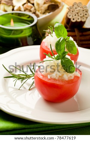 photo of delicious stuffed tomatoes with rice and basil