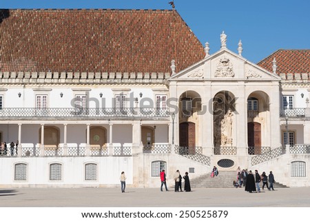 Coimbra, Portugal - Jan 2nd 2015 : students and tourists sit in front of the grand hall of Coimbra University