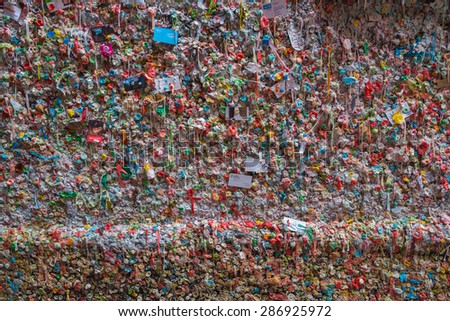 SEATTLE May 15th 2015: A Gum Wall background in downtown Seattle. It is a local landmark in Post Alley under Pike Place Market, Seattle Washington