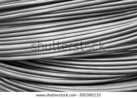 Close up wire coil texture in black and white for industrial background