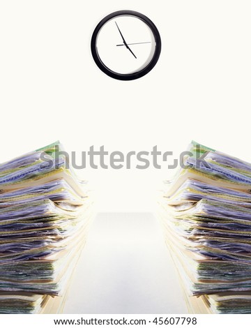 Stock image of two stacks of paperwork on desk, clock says it\'s almost time to leave...