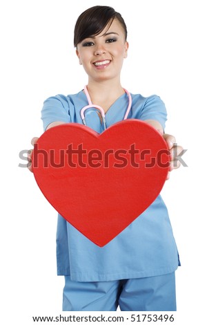Stock image of female health care worker holding heart