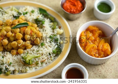 Indian Rice Pulao with Chick Peas, Broccoli, Peas and Sauces