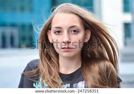 teen blonde female with big ears