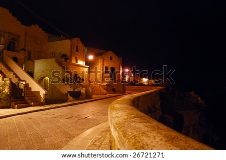 Night in Matera, Italy, on the Via Madonna Delle Virtu at the Edge of the Ravine