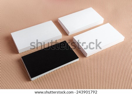 Blank black and white business cards on a color background. Template for branding identity.