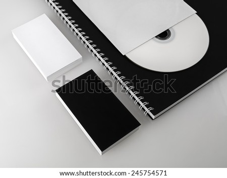 Business cards, compact disc and notepad. Template for branding identity for designers. Shallow depth of field.