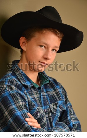 Teenager with cowboy hat/Young Cowboy/Portrait of a young American Cowboy