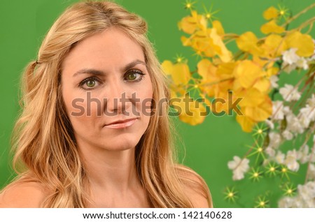 Woman in studio with natural plants/Attractive Young Woman/Portrait of an attractive woman