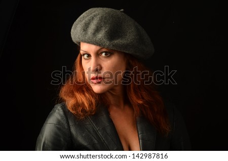 Woman wearing leather jacket/Bad Girl in Leather/Studio portrait of a woman in a leather jacket