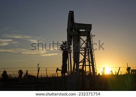 Sunrise at an oil pumping station/Oil Pumps/Oil pumps during the early morning