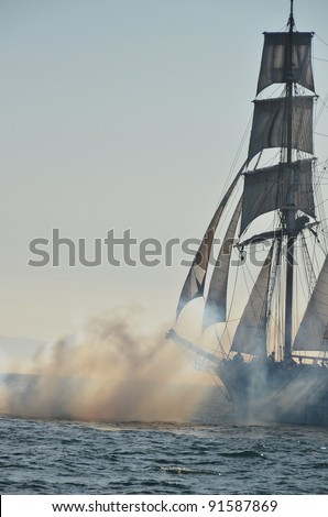 Tall Ship and gun fire/Tall Ship Battle/Smoke from cannon fire and tall ships