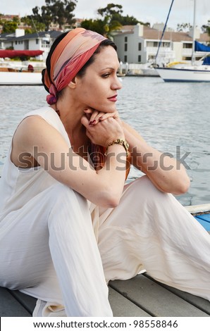 Woman in vintage clothing at the harbor/Vintage Clothing/Nostalgia Woman in Vintage Clothes