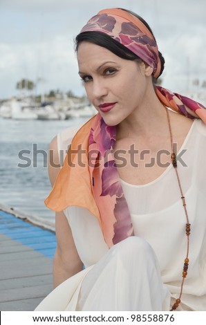 Woman in vintage clothing at the harbor/Vintage Clothing/Nostalgia Woman in Vintage Clothes