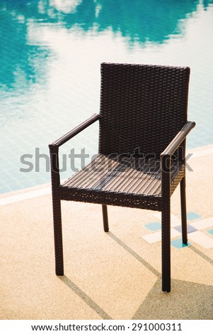 outdoor chair rattan armchairs on swimming pool