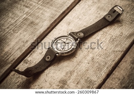 Old  watches on a wooden window sill