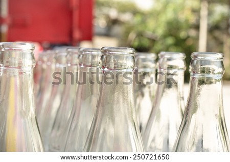 Close up of bunch of used glass bottles. Soft focus. / Bunch of used glass bottles. outdoor view/ Close up of bunch of used glass bottles. Soft focus.(bottles, glass, beverage)