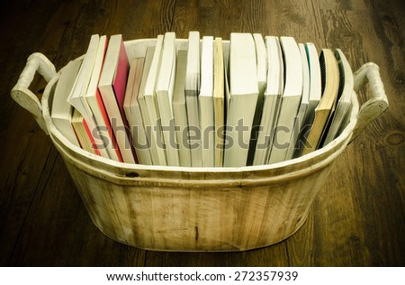 Books in the wooden basket. Vintage background /Vintage background with books in the wooden basket/ Books in the wooden basket (books, vintage, read)