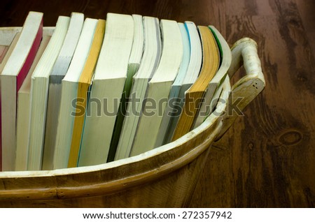 Books in the wooden basket. Vintage background /Close up of books in the wooden basket/ Close up of books in the wooden basket (books, vintage, read)
