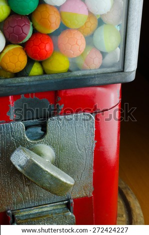 Close up of old vending balls machines / Colorful ball vending machine / Colorful ball vending machine (vending machine, coin, retro)