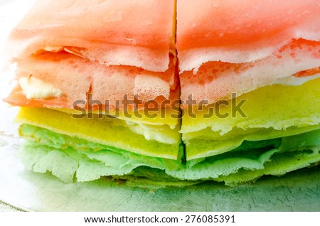 Rainbow vanilla crepe cake. Close up /Rainbow vanilla crepe cake / Rainbow crepe cake. for background (cake, dessert, vanilla)