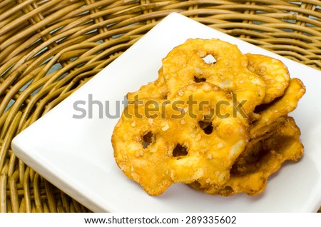 Pretzel crackers on bamboo tray/ Pretzel crackers / Pretzel crackers on bamboo tray .Close up  (pretzel, cracker, baked)