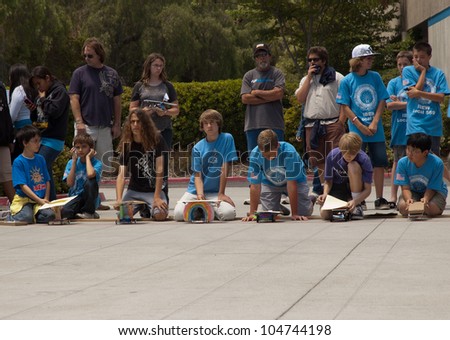 SAN DIEGO-JUNE 9:Unidentified students line up their solar cars at the start of Junior Solar Sprint in San Diego, CA on June 9, 2012. The student solar technology & engineering event was held annually