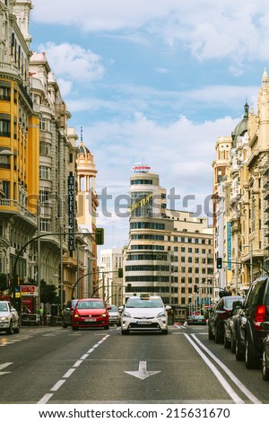 MADRID, SPAIN - SEPTEMBER 7: View Gran Via with the Capitol Building, one of the main streets and most famous landmarks of the city, on September 7, 2014 in Madrid, Spain