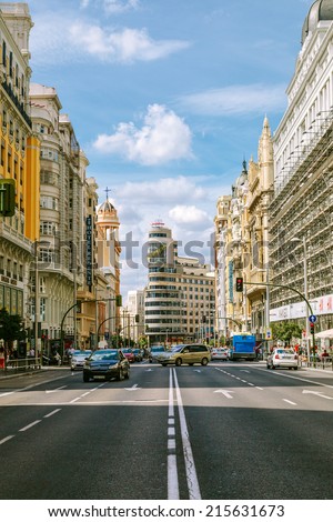 MADRID, SPAIN - SEPTEMBER 7: View Gran Via with the Capitol Building, one of the main streets and most famous landmarks of the city, on September 7, 2014 in Madrid, Spain