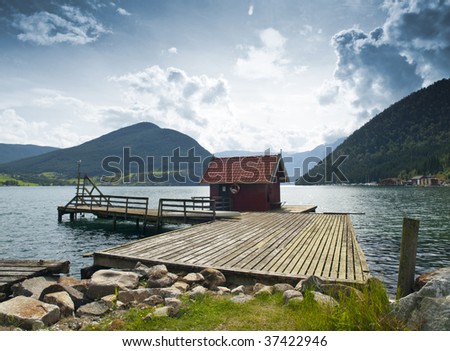Wood cabin in the dock of Kaupanger, Norway
